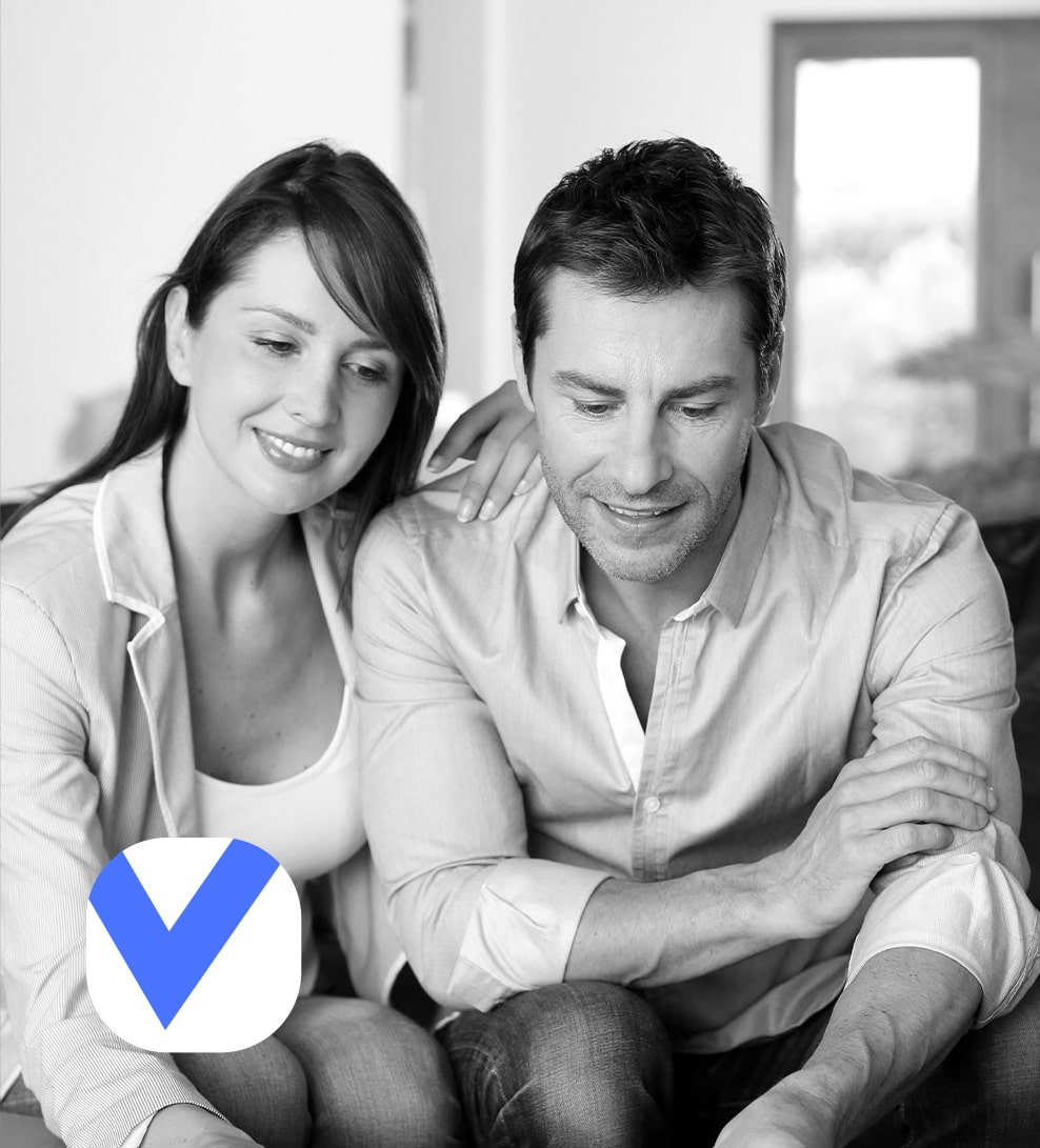 Couple reviewing mortgage documents together